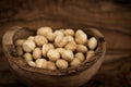 Macadamia on olivewood Royalty Free Stock Photo