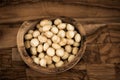 Macadamia on olivewood Royalty Free Stock Photo