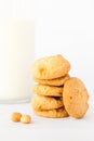 Macadamia and white chocolate cookies and a glass of milk