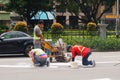 Macao, China: workers in the road construction