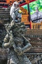 Macaque in the Hindu temple in Monkey Forest, Ubud, Bali Royalty Free Stock Photo