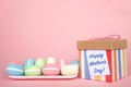 Macaron Mother`s Day present on pink background Royalty Free Stock Photo