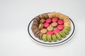 Macaron sweet confection on a plate Royalty Free Stock Photo