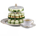 Macaron tower with tea cup, transparent background. Royalty Free Stock Photo
