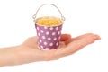 Macaroni in a bucket in hand