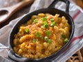 Macaroni and cheese baked in cast iron skillet Royalty Free Stock Photo