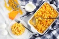 Macaroni and Cheese in baking dish and on plate Royalty Free Stock Photo