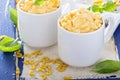 Macaroni and cheese served in mugs Royalty Free Stock Photo