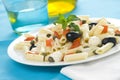 Macaroni mozzarella olives capers tomatoes salad Royalty Free Stock Photo