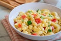 Macaroni salad with elbow pasta and vegetables in bowl Royalty Free Stock Photo