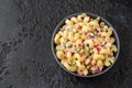 Macaroni Salad with red bell pepper, onion, celery, gherkins and mayonnaise dressing Royalty Free Stock Photo