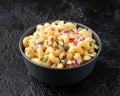 Macaroni Salad with red bell pepper, onion, celery, gherkins and mayonnaise dressing Royalty Free Stock Photo