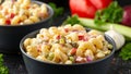 Macaroni Salad with red bell pepper, onion, celery, gherkins and mayonnaise dressing Royalty Free Stock Photo