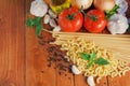 Macaroni and spaghetti ingredients on wood Royalty Free Stock Photo