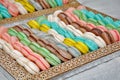 Macarons background. Colourful typical French pastry. Top view