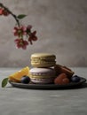 Macarons with Blossoms and Berries Royalty Free Stock Photo