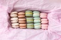 Macarons cake, top view flat lay, macaroons on pink background