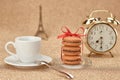 Macarons.Gold alarm clock, cup coffee,Eiffel Tower Royalty Free Stock Photo