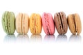 Macarons macaroons cookies dessert from France in a row isolated