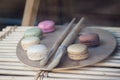 Macarons on paint palette Royalty Free Stock Photo