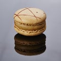 MacaronÃÂ¯ÃÂ¼Ãâ a round, colored cookie consisting of a ganache or buttercream