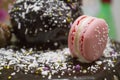 Macaroon on chocolate cake`s top Royalty Free Stock Photo