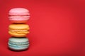Macaroon over red background