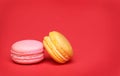 Macaroon over red background