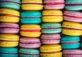 Macaroons background. Different bright, colorful macaroons in gift box. Variety of french almond macaron cookies