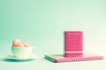 Macaroons in a cup and tea tin Royalty Free Stock Photo