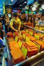 MACAU, CHINA- MAY 11, 2017: An unidentified people watching a delicious chinese food, dried meat slice