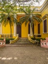 MACAU,CHINA - NOVEMBER 2018: The vibrant yellow Qingcao hall of the Lou Lim Leoc public garden and park Royalty Free Stock Photo