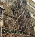 Macau Chinese Architecture Construction Lifestyle Building Bamboo Scaffold Spiderman Aerial Acrobats Circus Act Kung Fu Master Royalty Free Stock Photo