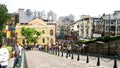 Crowded main street to St. Pauls Cathedral in Macau in a normal day before the pandemic