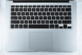 Macbook Air is isolated in white