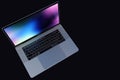 MacBook Pro 15 inch laptop computer dark background Royalty Free Stock Photo