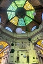 Macca Villacrosse Passage - a fork-shaped, yellow glass covered arcaded street in central Bucharest, Romania. Pasajul Macca-