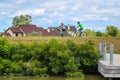 Bicyclists enjoy ride at the Erie Canal canal way trail in Upstate New York Royalty Free Stock Photo