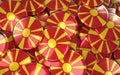 Macedonia Badges Background - Pile of Macedonian Flag Buttons.