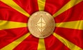 Macedonia flag ethereum gold coin on flag background. The concept of blockchain bitcoin currency decentralization in the