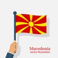 Macedonia flag holding in hand