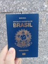 Maceio-AL, Brazil - september 07 2019 - Man hand holding a brazilian passport
