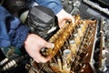Machanic repairman at automobile car engine repair Royalty Free Stock Photo