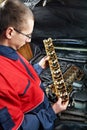 Machanic repairman at automobile car engine repair Royalty Free Stock Photo