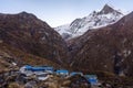 Machapuchare Base Camp village and snowcapped Machapuchare peak Fish Tail behind, Himalayas