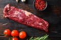 Machete steak raw alternative beef cut or hanging tende cut, with rosemary over wood background Top side view Royalty Free Stock Photo