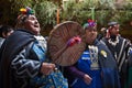 Mapuche machi plays the drum in ancestral ceremony