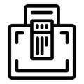 Machine analyzing document with graph showing data analysis results