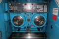 This machine center features a control panel, chucks, and precision engineering designed for metalworking and tooling in an Royalty Free Stock Photo