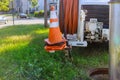 Machine for cleaning sewer wells in the a town street